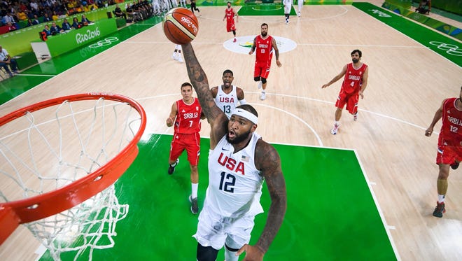 2016: United States center Demarcus Cousins (12) dunks over Serbia during the game in the preliminary round of the Rio 2016 Summer Olympic Games.