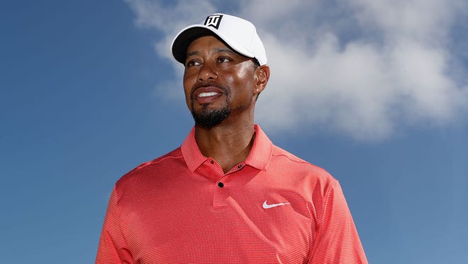 Tiger Woods walks off the 18th green after the pro-am for the Hero World Challenge.