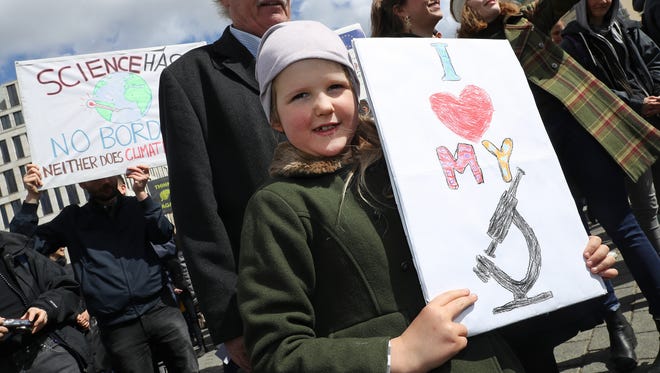 Aniela, 7, joins the March for Science demonstration in Berlin, Germany.