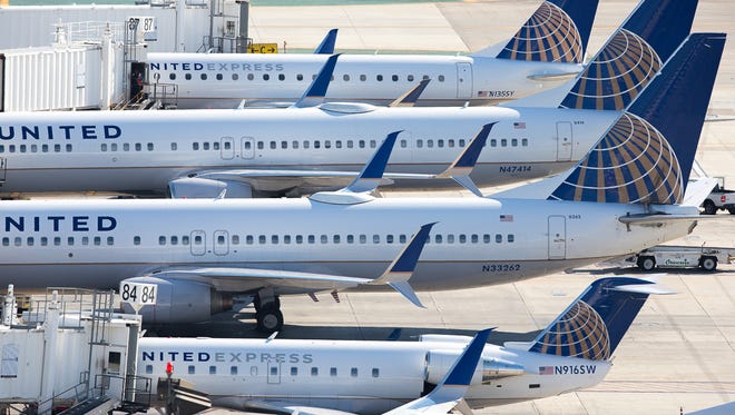 United Airlines jets line Terminal 7 at Los Angeles International Airport on Nov. 8, 2015.