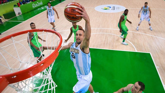 2016: Ginobili dunks during the men's preliminary game against Brazil in the Rio Olympic Games.