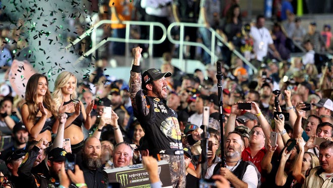 Martin Truex Jr. (78) celebrates winning the NASCAR Cup Series championship at Homestead-Miami Speedway on Nov. 19.