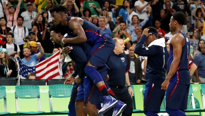 United States center DeAndre Jordan (6) and United States forward Jimmy Butler (4) celebrates after beating China in the men's basketball group A  preliminary round during the Rio 2016 Summer Olympic Games at Carioca Arena 1.