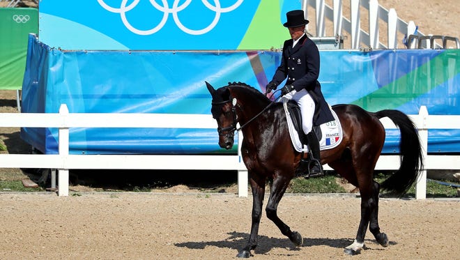 Karim Laghouag of France rides during equestrian eventing dressage in Rio 2016 Summer Olympic Games at Olympic Equestrian Centre.