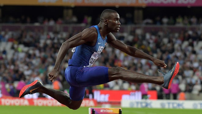 Kerron Clement of the USA advances to the final in the 400 hurdles.