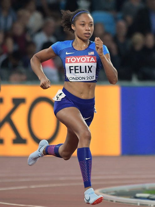 Allyson Felix of the USA advances to the final of the 400.