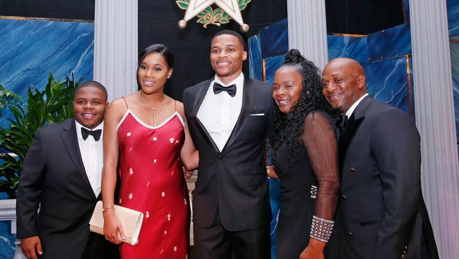 2016: Russell Westbrook poses for a photo with his brother Ray Westbrook; his wife, Nina Westbrook; his mother, Shannon Westbrook; and his father, Russell Westbrook.