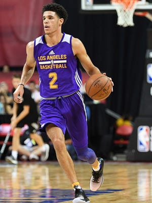 Los Angeles Lakers guard Lonzo Ball (2) dribbles during an NBA Summer League playoff game against the Dallas Mavericks.