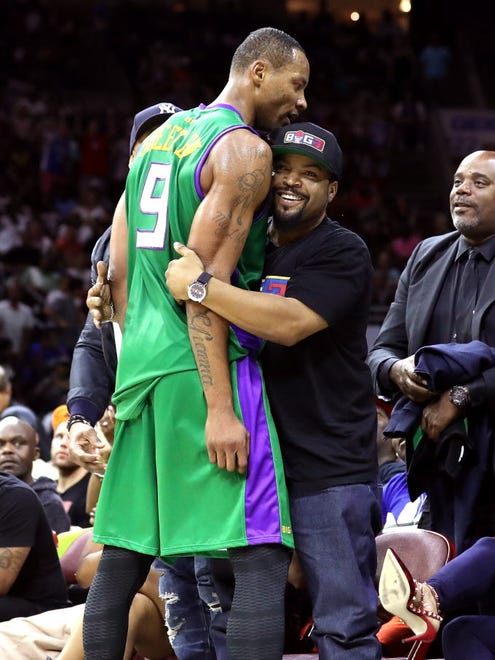 Rashard Lewis of the 3 Headed Monsters celebrates with league founder Ice Cube after a game-winning basket against the Killer 3s during Week 4.