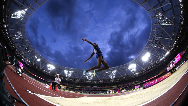 Jarrion Lawson of the USA took second in the long jump with a leap of 27-8 1/4 (8.44m).