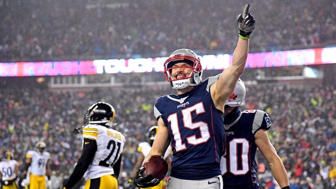 Patriots wide receiver Chris Hogan (15) celebrates after scoring a touchdown during the first quarter against the Steelers.