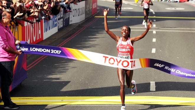 Rose Chelimo of Bahrain wins the women's marathon.