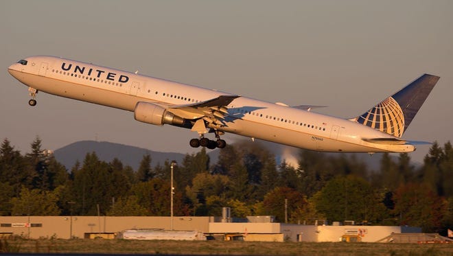 A United Airlines Boeing 767-400 takes off from Seattle-Tacoma International Airport in September 2015.