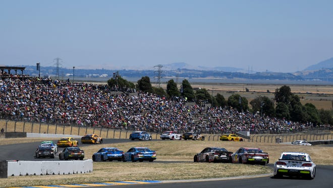 Drivers go through Turn 8 during the Toyota/Save Mart 350 at Sonoma Raceway on June 25. Kevin Harvick won.