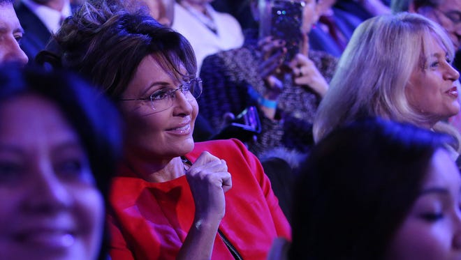 Palin watches from the audience during the Republican presidential debate in Las Vegas on Dec. 15, 2015.
