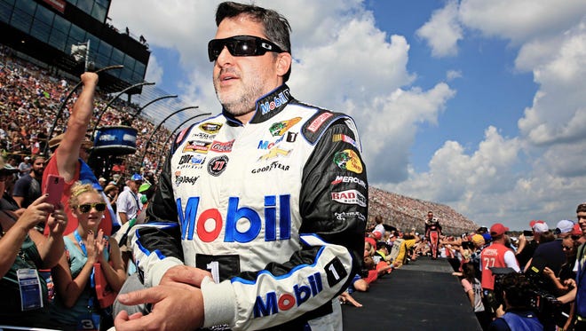 Tony Stewart during driver introductions prior to the 2015 Pure Michigan 400 at Michigan International Speedway.