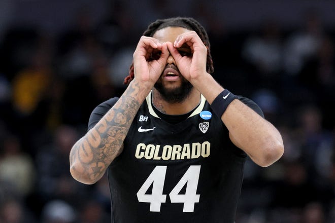Eddie Lampkin Jr. of the Colorado Buffaloes celebrates a basket against the Marquette Golden Eagles during the first half of the NCAA Tournament second-round game on March 24, 2024, at Gainbridge FieldHouse in Indianapolis.