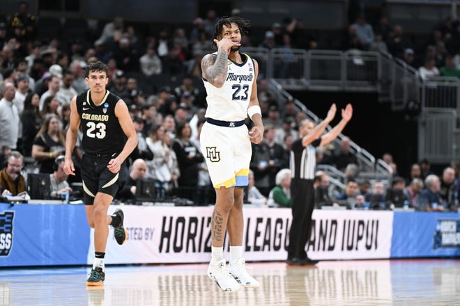 Marquette Golden Eagles forward David Joplin (23) reacts after scoring against the Colorado Buffaloes during the first half of the NCAA Tournament second-round game on March 24, 2024, at Gainbridge FieldHouse in Indianapolis.