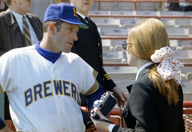 Milwaukee Brewers outfielder Russ Snyder talks to an unidentified reporter before the Brewers' first opening day on April 7, 1970. It was also the season opener for the Brewers. A crowd of 37,237 saw the Brewers fall to the California Angels 12-0.