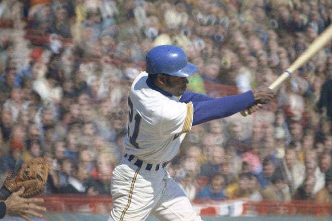 Brewers infielder Tommy Harper (21) takes a swing during the Brewers' first opening day on April 7, 1970. The game was also the season opener for the Brewers. A crowd of 37,237 saw the Brewers fall to the California Angels 12-0.