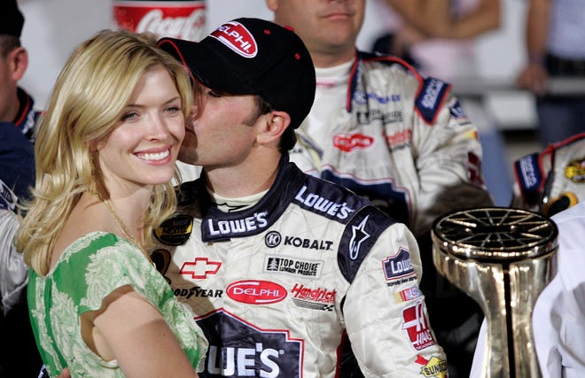 Jimmie Johnson married his wife Chandra in December of 2004. Here the couple celebreate Johnson's victory at the 2005 Coca-Cola 600.