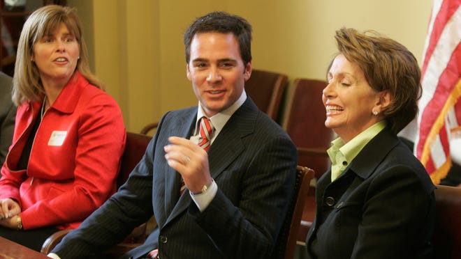 Jimmie Johnson shares a laugh with Congresswoman Nancy Pelosi, then Speaker of the House, during a visit to Capitol Hill on Feb. 5, 2007. A reporter asked if he was a Democrat or Republican. The Speaker changed the subject.